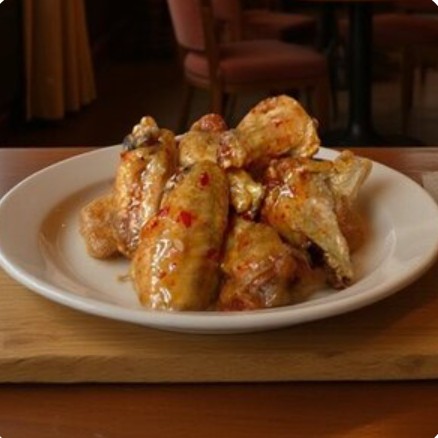 Куриные крылья в соусе сладкий-чили