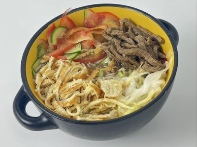 Куксу с говядиной на горячем бульоне