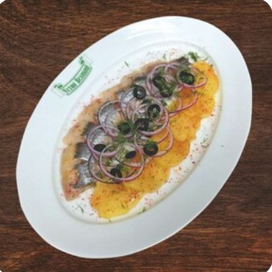 Сельдь с жареным картофелем и луком