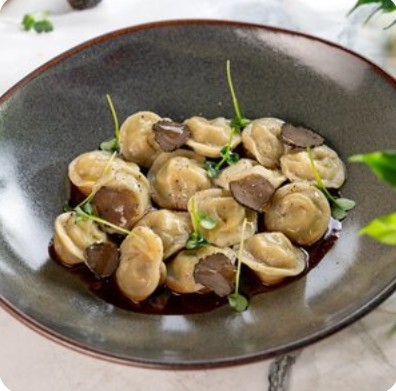 Пельмени с уткой, белыми грибами и трюфелем