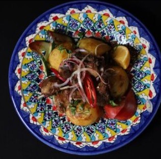 Конина, тушенная с овощами
