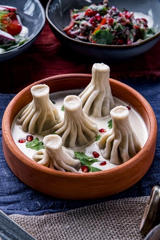 Д Мини-хинкали из свинины и говядины в сливочном соусом