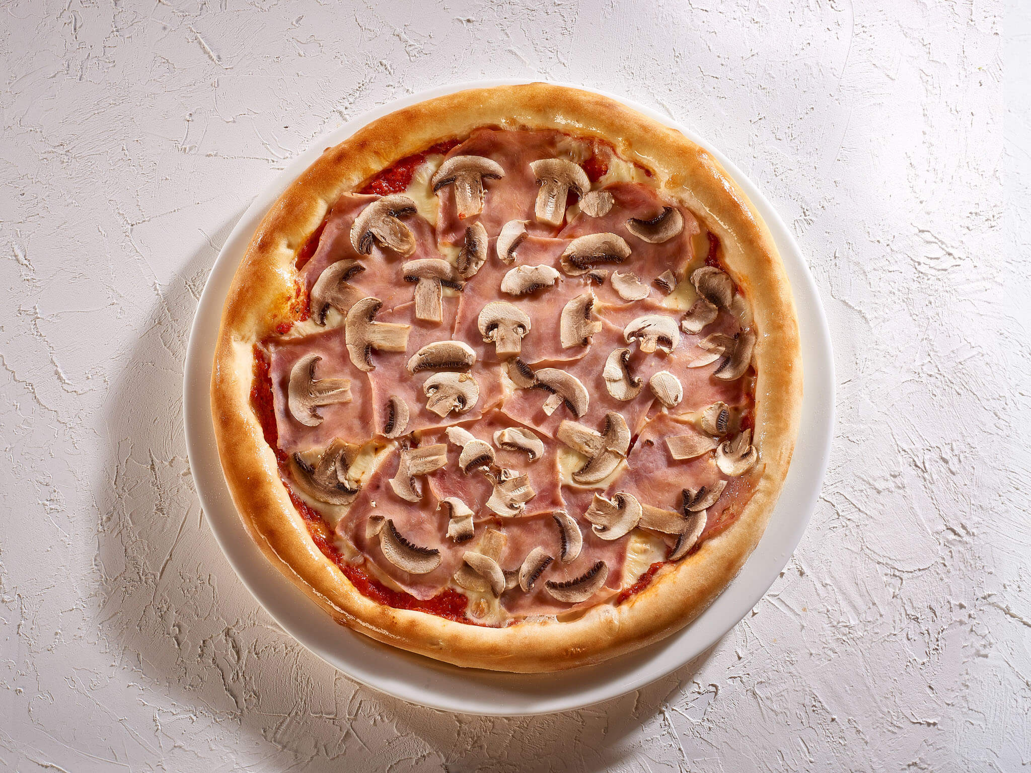 Prosciutto e funghi