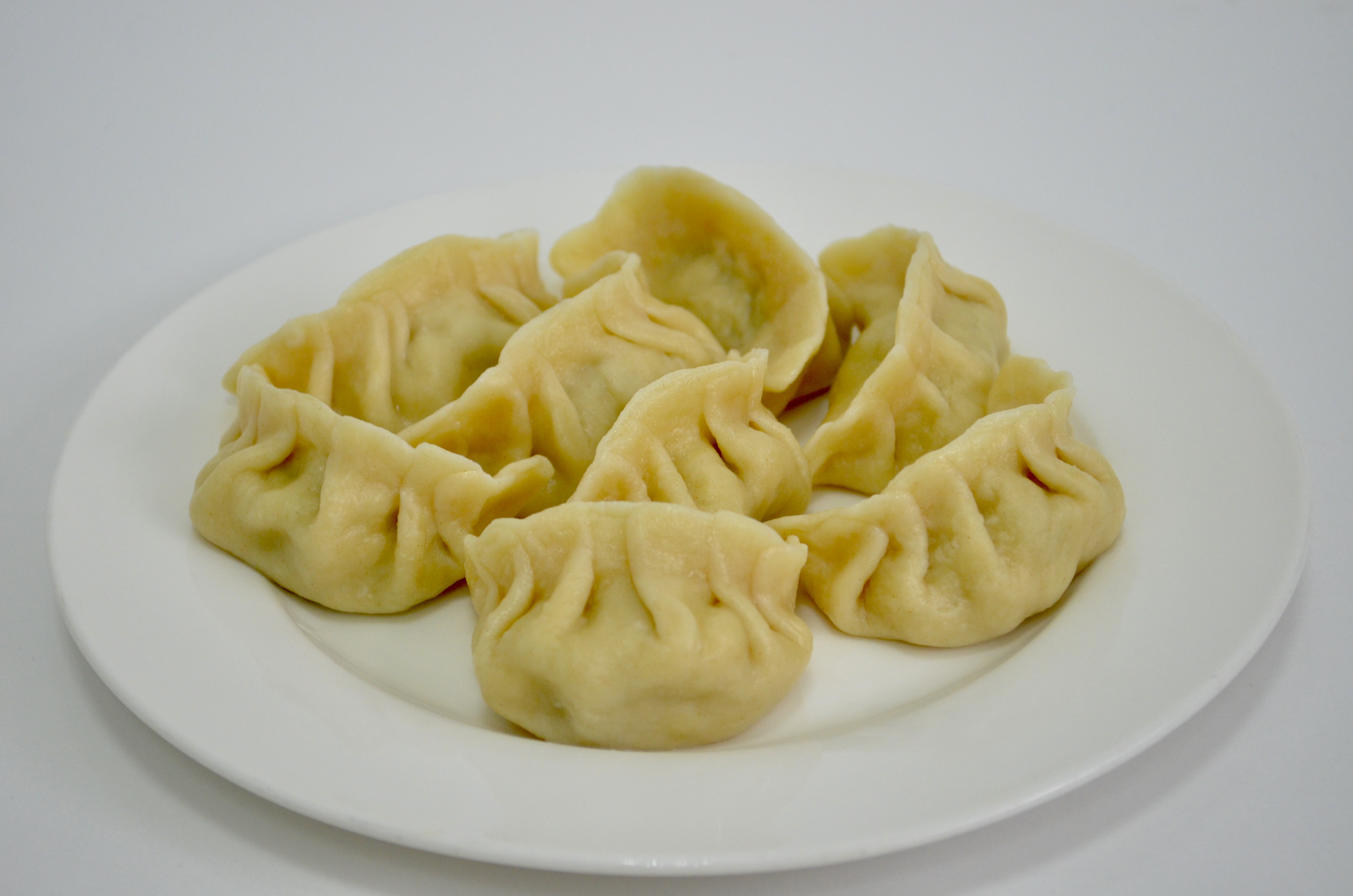 Пельмени со свининой и капустой