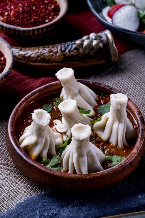 Д Мини-хинкали из свинины и говядины в грузинском соусе