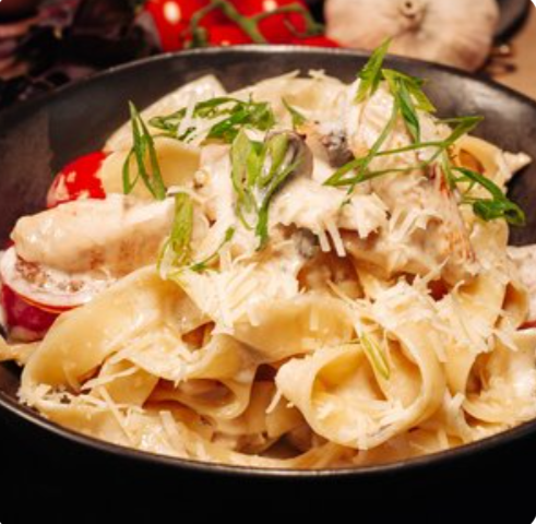 Паста с куриным филе и грибами