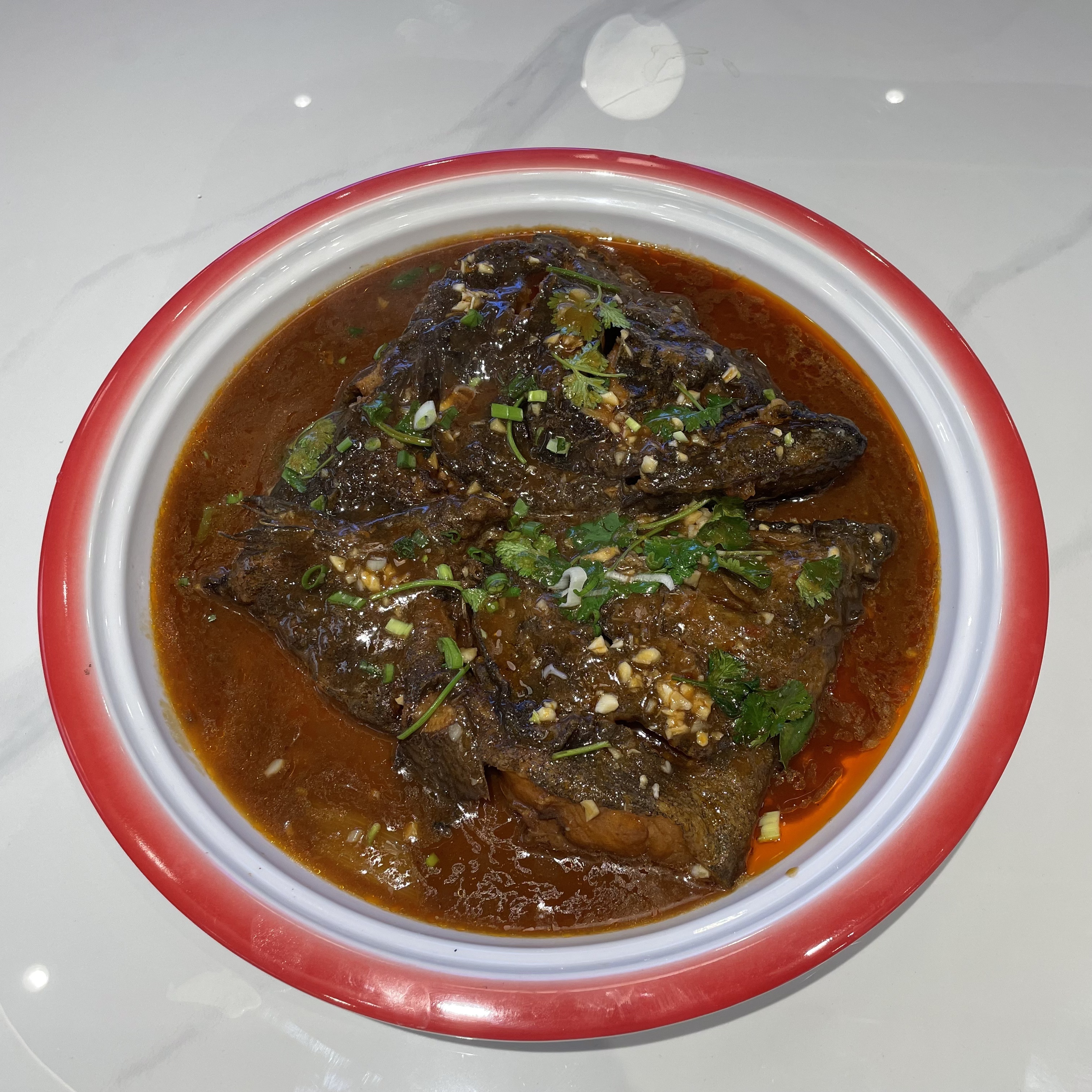 H-17-2 红焖蝶鱼头 Камбала голова с соевым соусом.