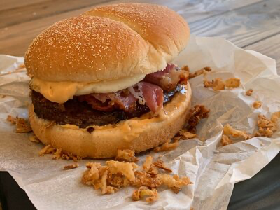 За обе щеки