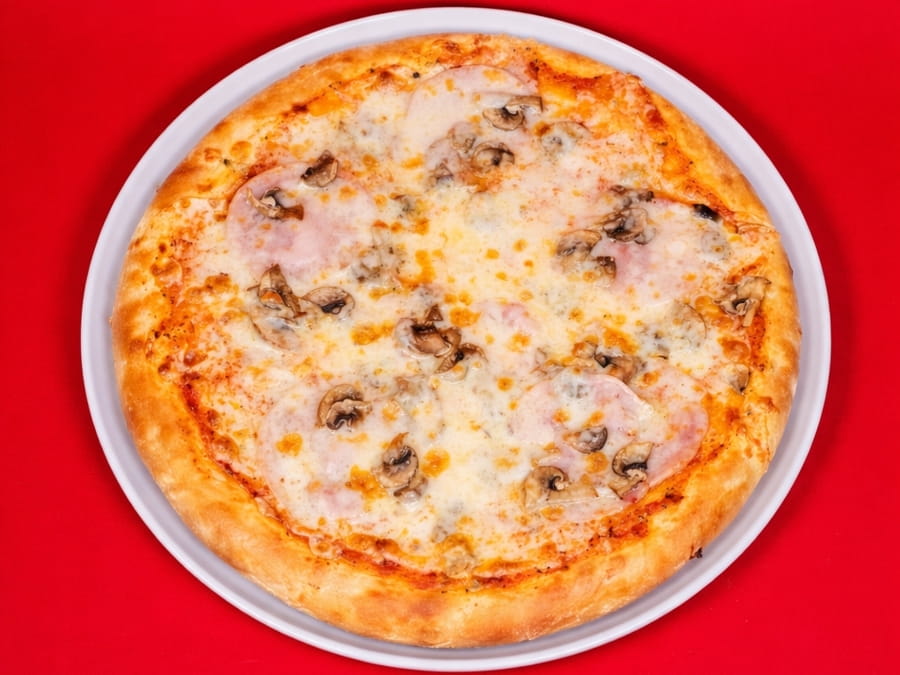 Пицца ветчина и грибы