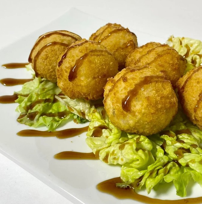 Рисовые шарики с угрем и соусом Унаги