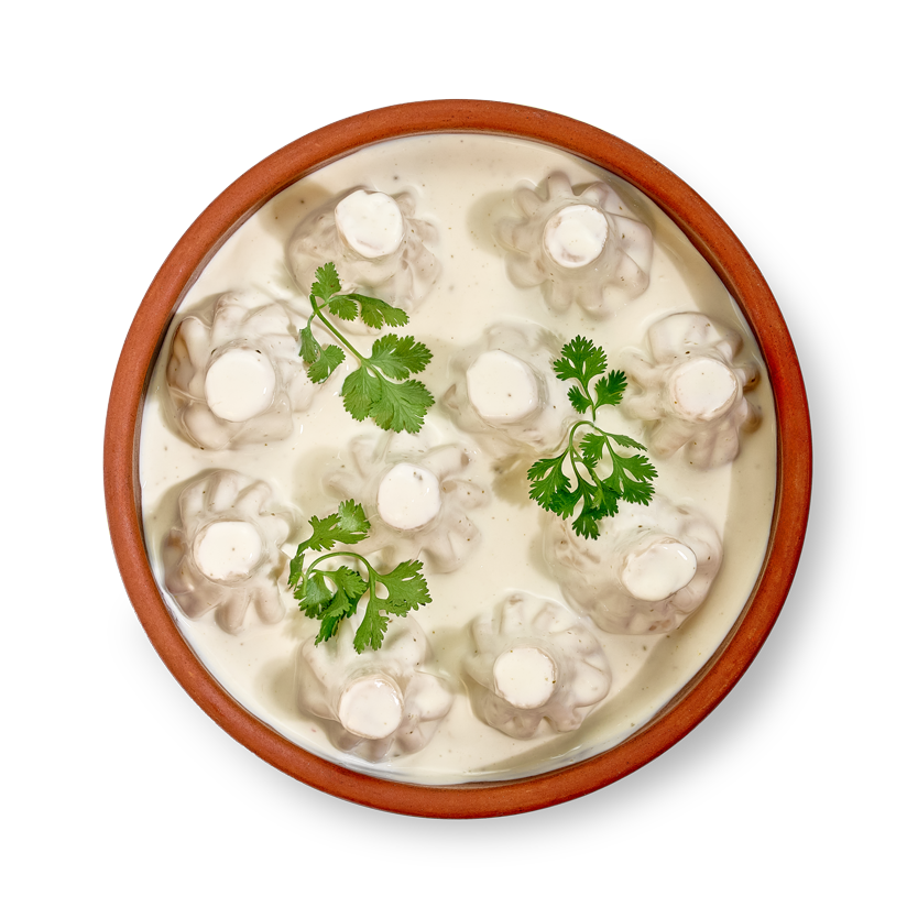 Мини-хинкали с курицей в сырном соусе