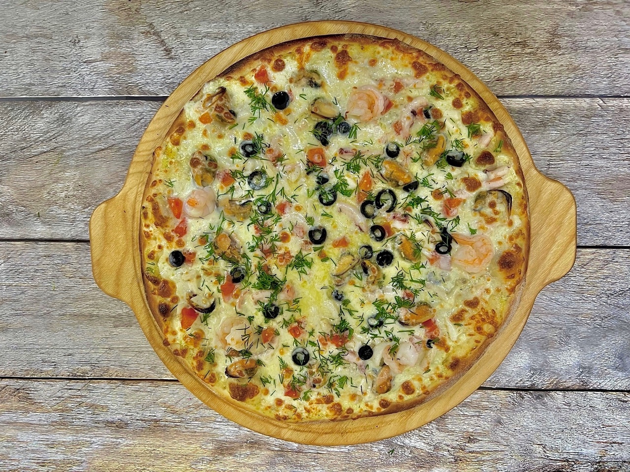 С морепродуктами 23см