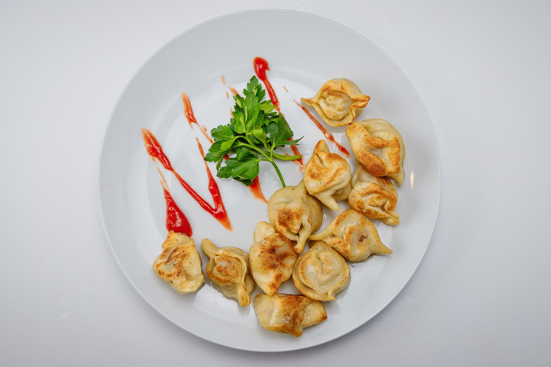 Пельмени жареные