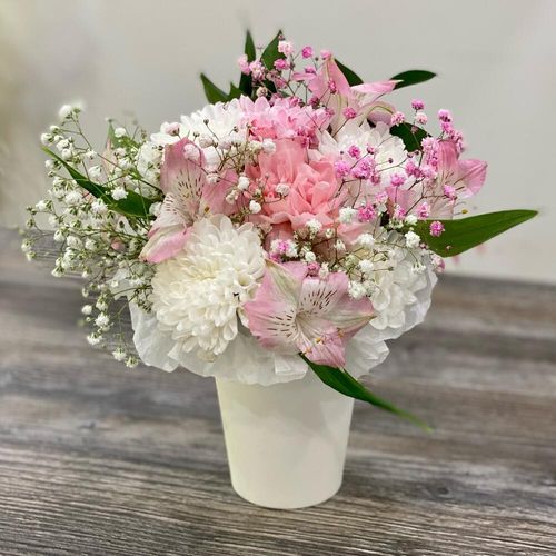 Цветы в стаканчике