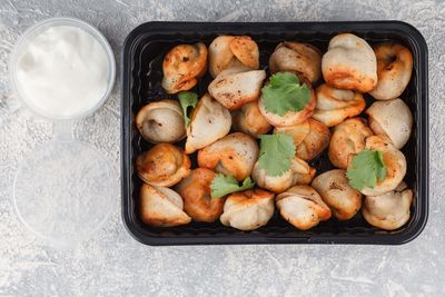 Пельмени мясные жареные