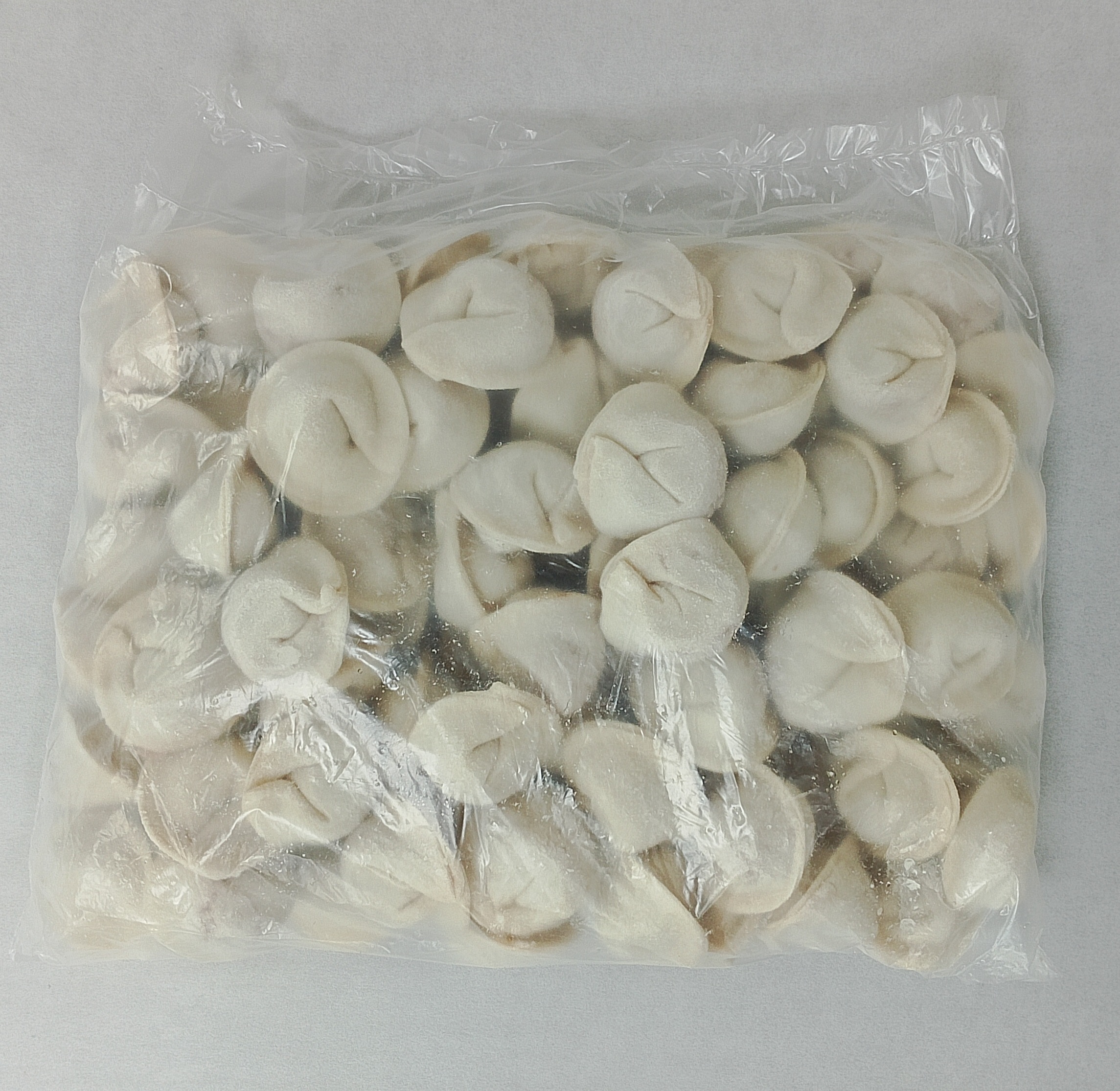 Пельмени со свининой и капустой