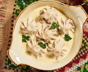 Хинкали из говядины в сливочном соусе