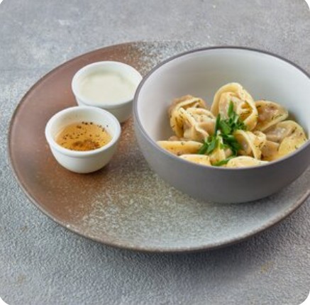 Домашние пельмени в бульоне