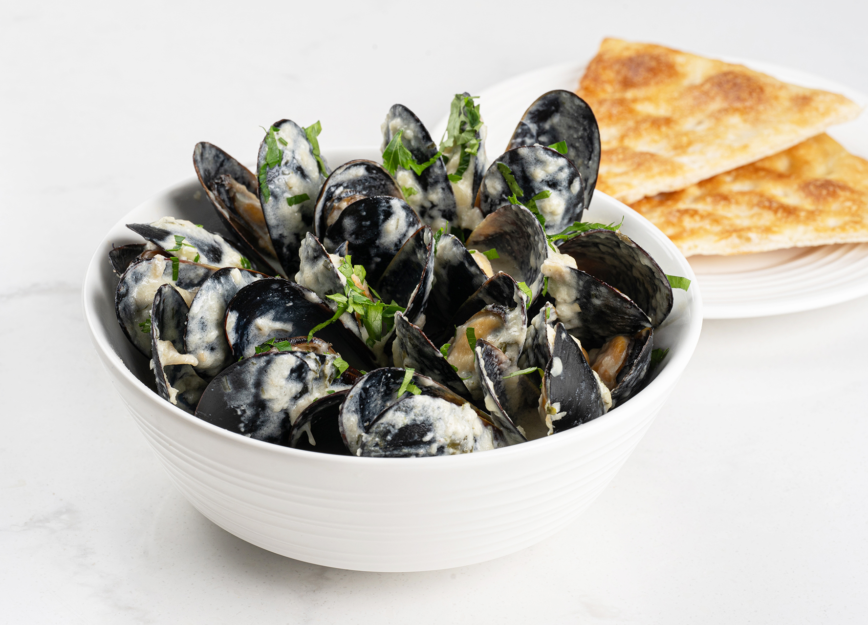 Мидии в сливочном соусе