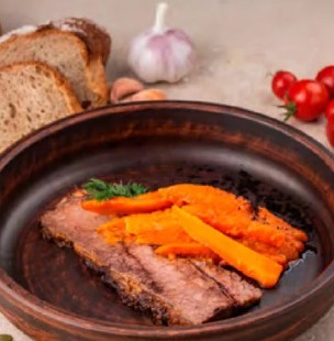 Томленая грудинка бычка с овощами