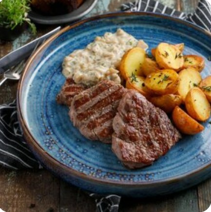 Медальоны из телятины с гарниром