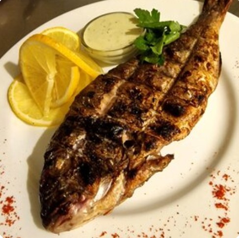 Дорада на мангале