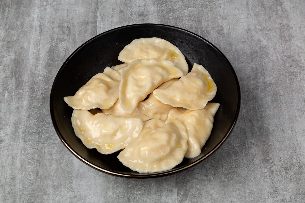 Вареники с тушеной капустой