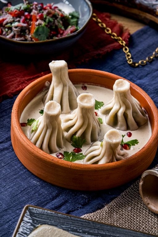 Д Мини-хинкали с цыпленком в сливочном соусом