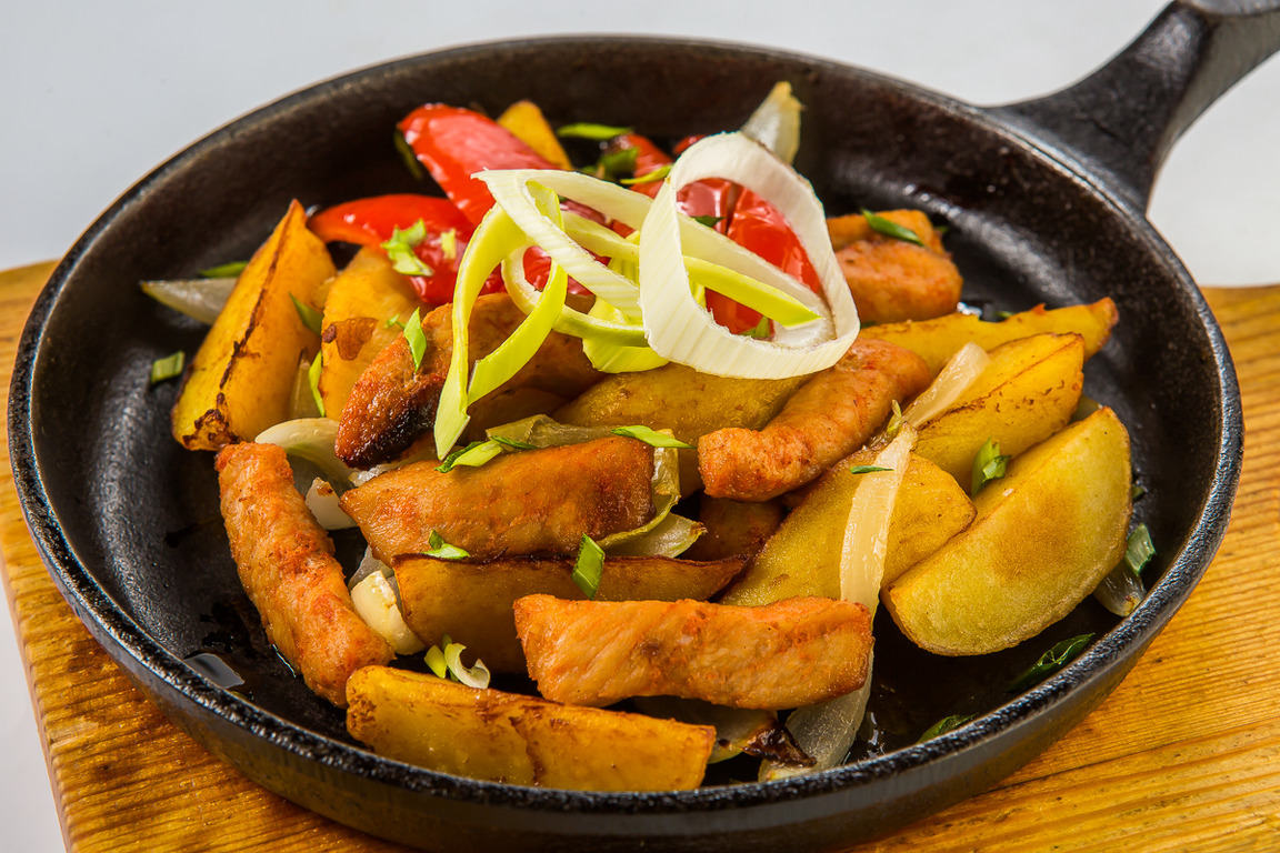 Маринованная свинина с овощами