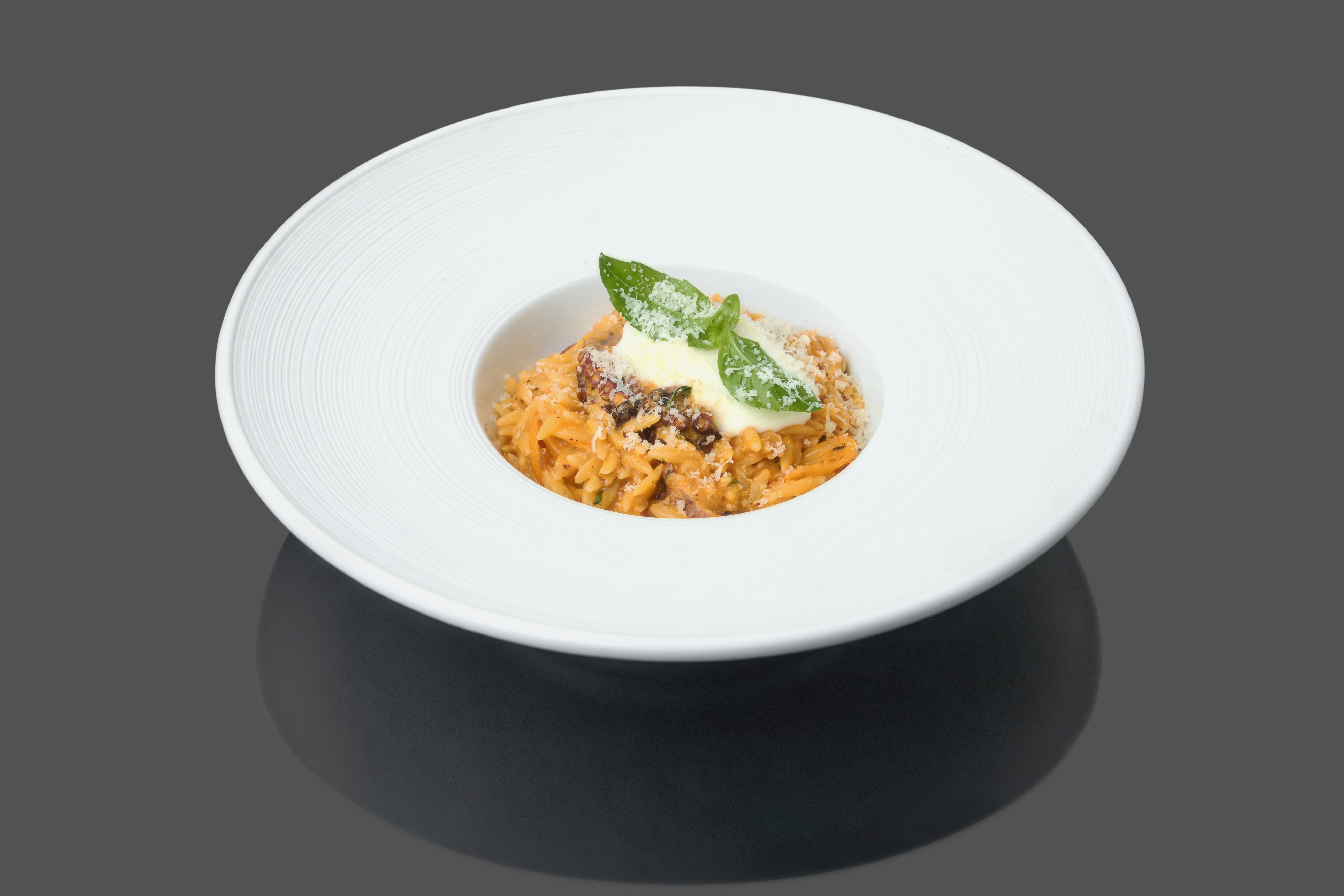 Орзотто с осьминогом и эспумой из феты