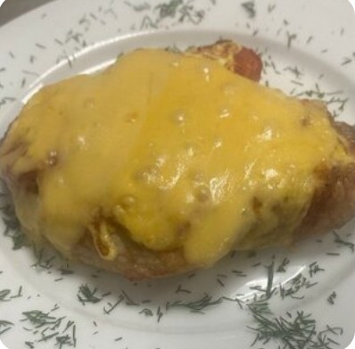 Свинина, запеченная с сыром и помидором