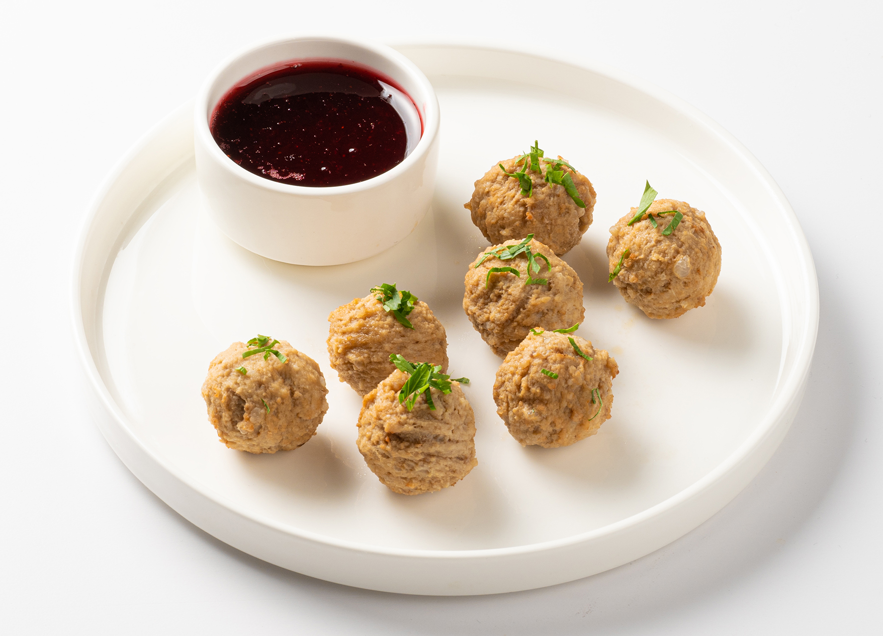 Фрикадельки с брусничным соусом