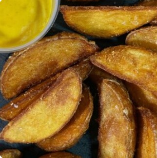 Картофельные дольки со специями по-деревенски