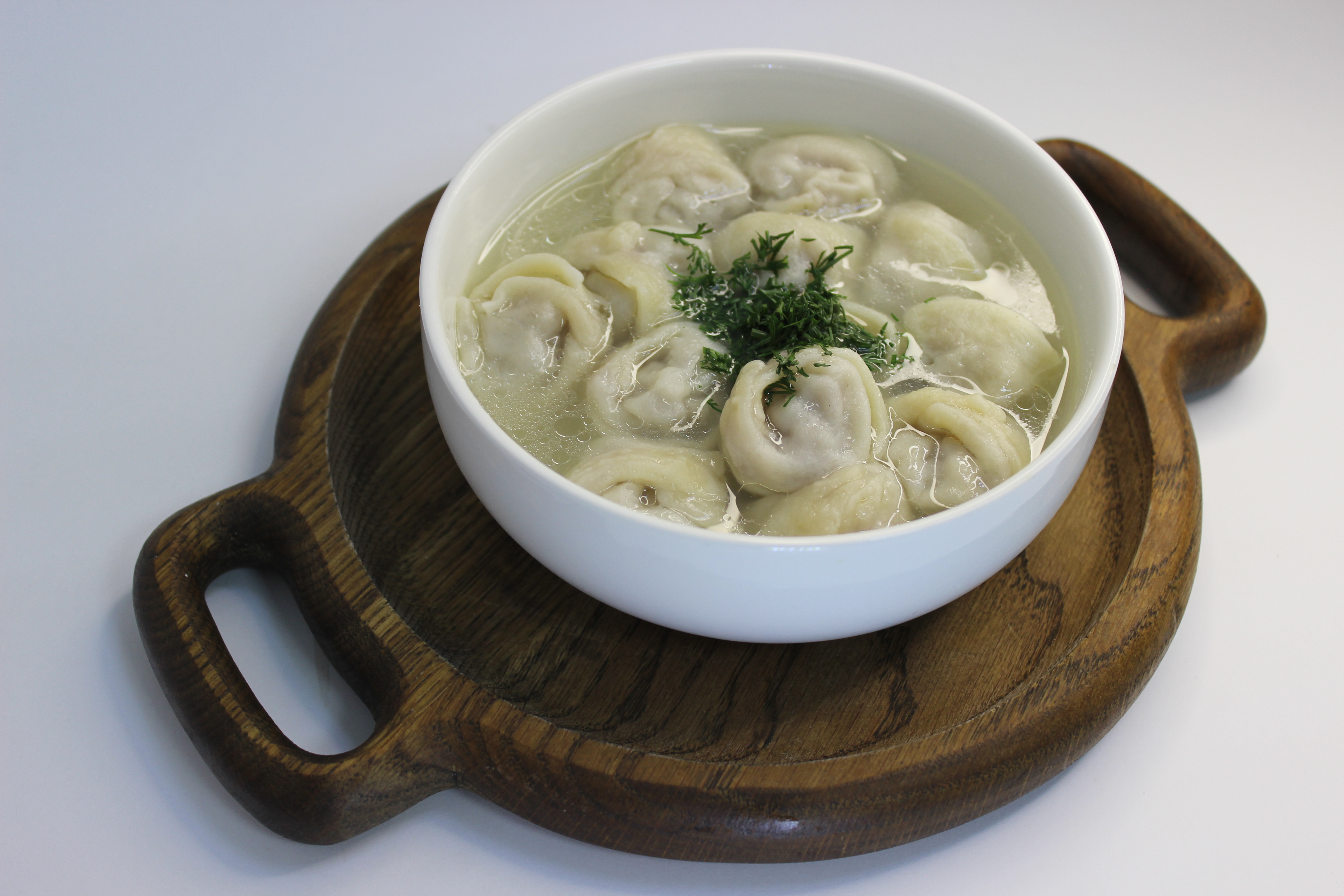 Пельмени с бульоном