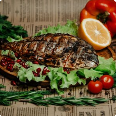 Дорадо целая на мангале