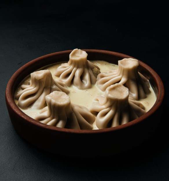 Патара-хинкали с куриц. в соусе шкмерули