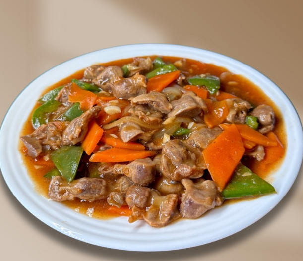 Куриные желудки с овощами