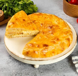 Осетинский пирог с сыром и свекольными листьями