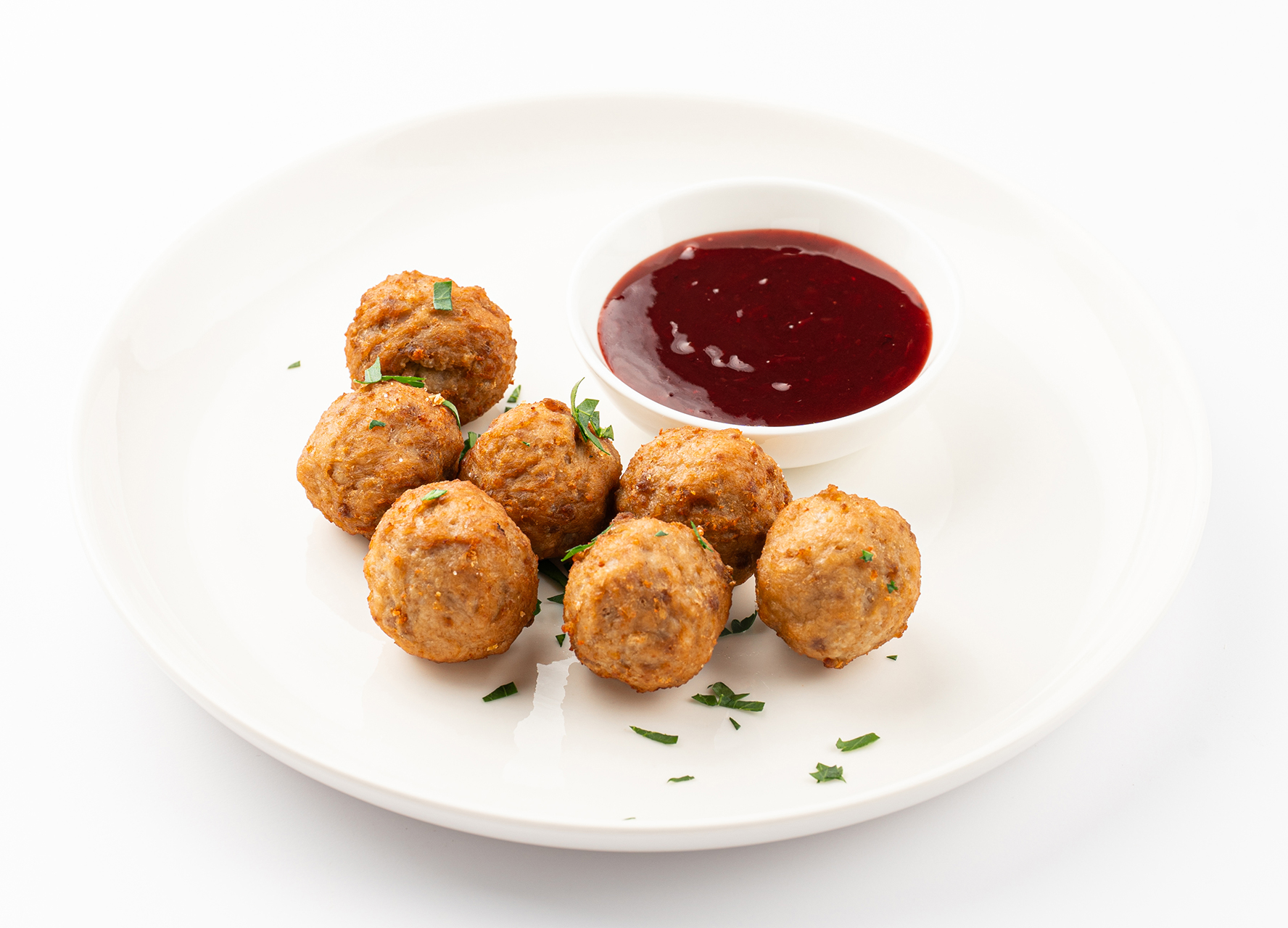 Фрикадельки с брусничным соусом