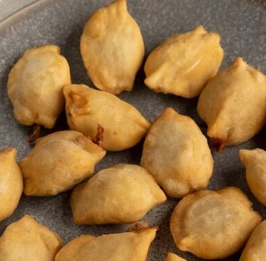 Пельмени жареные