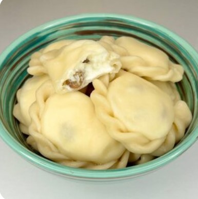 Вареники с творогом и изюмом