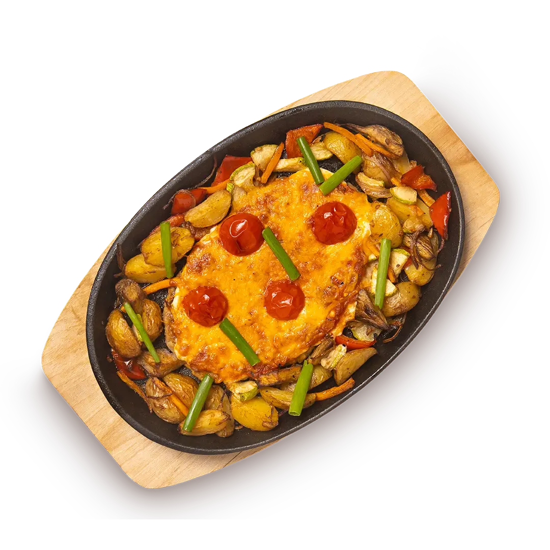Отбивная из свинины с томатным соусом, сыром чеддер и овощами