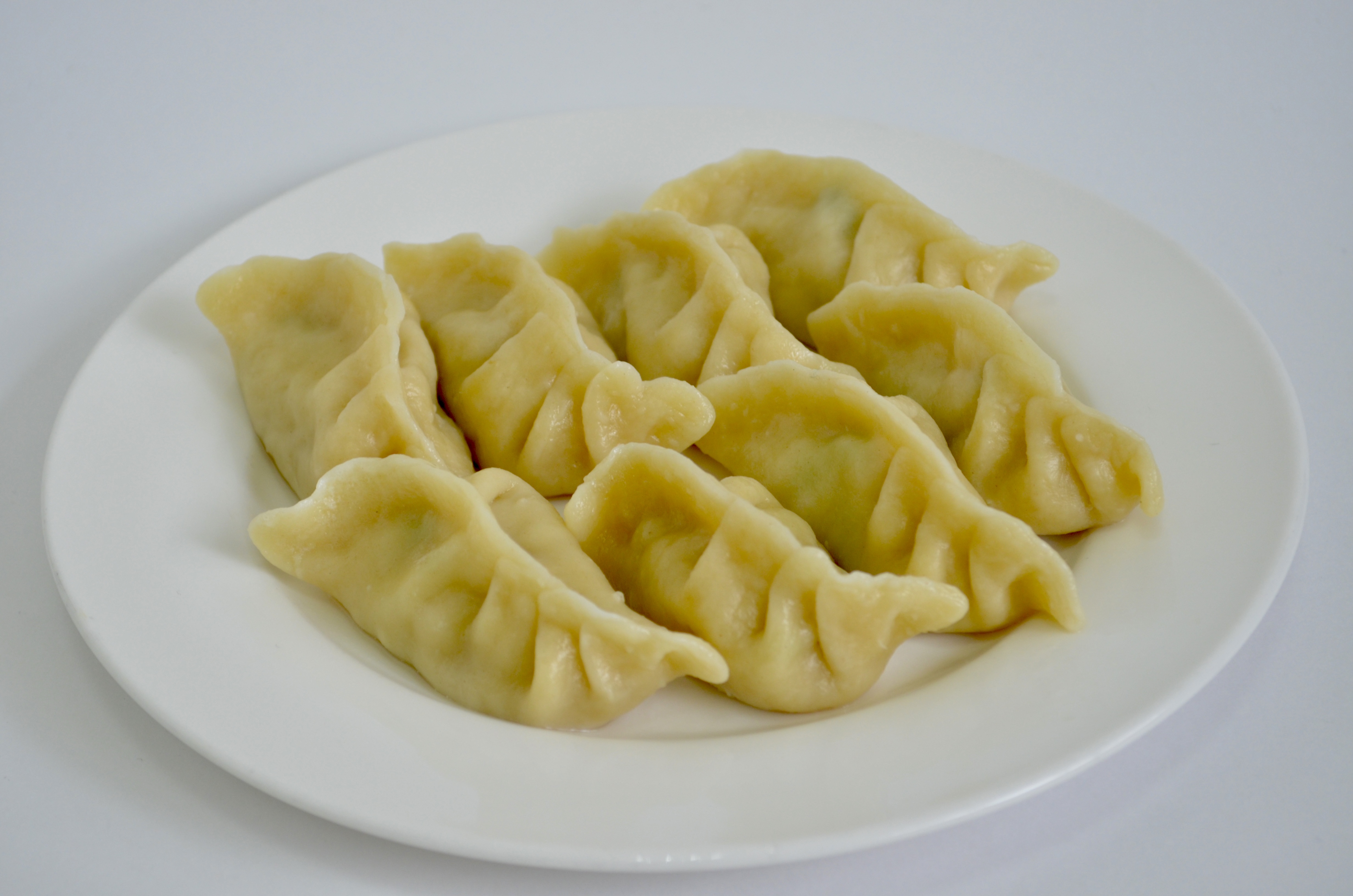 Пельмени с рыбой и кальмаром