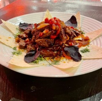 Телятина под гранатовым соусом