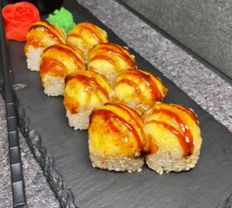 Запеченный с мидиями в кунжуте