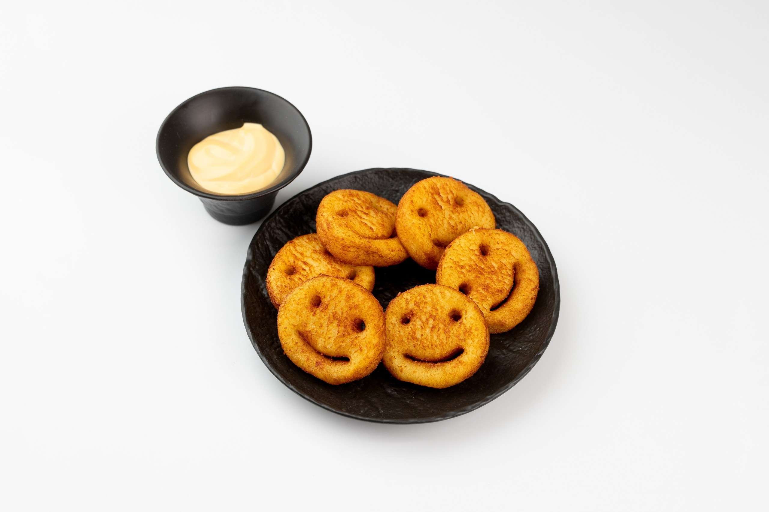 Картофельные улыбки с сырным соусом