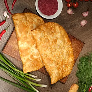Со свининой и говядиной чебурек