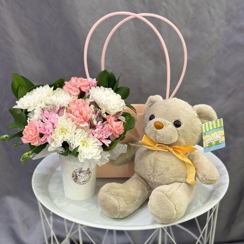 Мягкая игрушка Мишка с букетом цветов в стаканчике (0606)