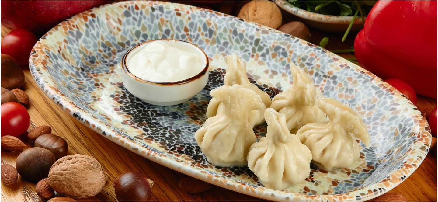Мини хинкали с цыпленком и сметаной