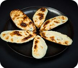 Запеченные мидии в сырном соусе